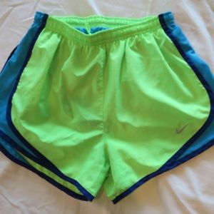 Blue and green nike shorts
